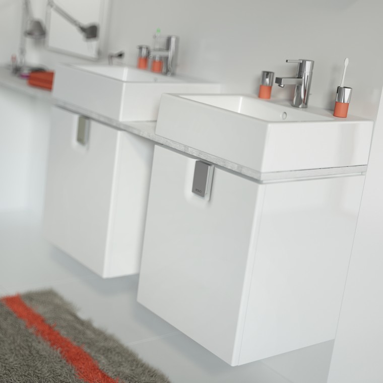 Biała łazienka z produktami marki Koło serii Twins / umywalki z szafkami
